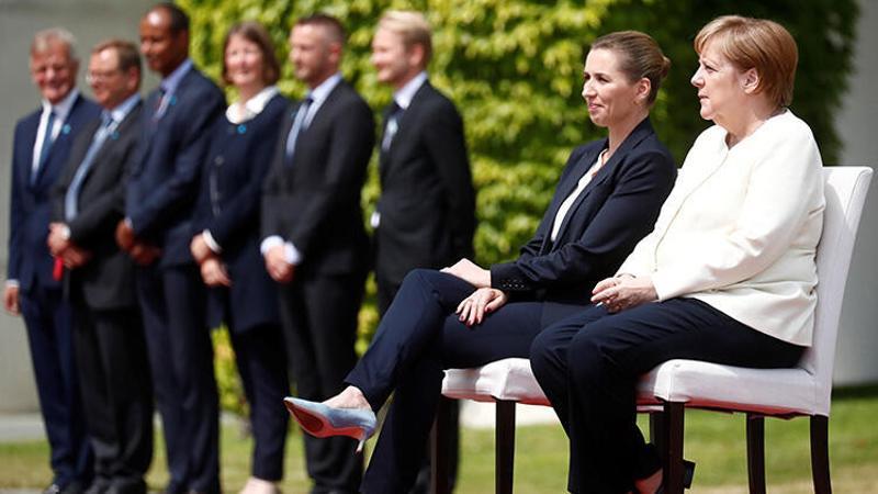 Merkel'in titremesine sandalyeli önlem